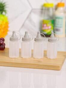 12 piezas Botellas portátiles mini para condimentos, recipientes a prueba de fugas para aliños y salsas - Almacenamiento de alimentos de plástico reutilizable para camping, picnics, escuela y oficina, utensilios de cocina - Multicolor - Ver 5