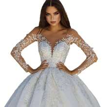 Romantic Off-Shoulder Long Sleeve Lace Appliqué Ball Gown Wedding Dress With Deep V-Neck And Open Back – Premium Soft Tulle With Hand-Applied 3D Floral Lace Appliqués, Off-Shoulder Neckline With Illusion Long Sleeves, Fitted Bodice With Deep V-Neck And Open Back, Full A-Line Ball Gown Skirt With Floor-Length Train, Available In Ivory – Perfect For Spring/Summer Outdoor Weddings, Garden Ceremonies, And Vintage Themed Events, Lightweight And Flowing Design, Ideal For Warm Weather, International Export Quality, Suitable For Global Bridal Market - Blanco - Ver 5