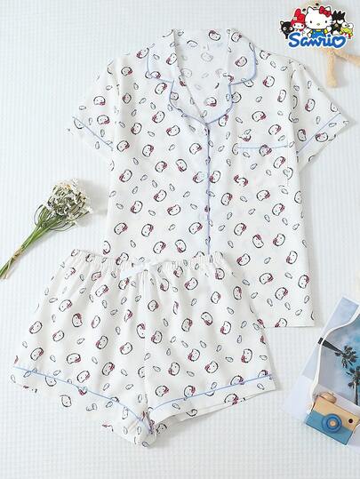 SANRIO Bộ đồ ngủ nữ, gồm áo tay ngắn in hình cá có túi và quần short thắt nơ, thích hợp mặc ở nhà.
