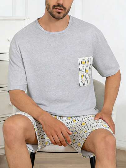 男士休闲睡衣套装，轻薄圆领卡通印花短袖短裤，舒适简约夏季家居服
