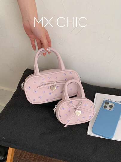 1个女士纯色PU波士顿手提包，饰有蝴蝶结和花卉印花，适合携带手机、钱包、购物袋等。