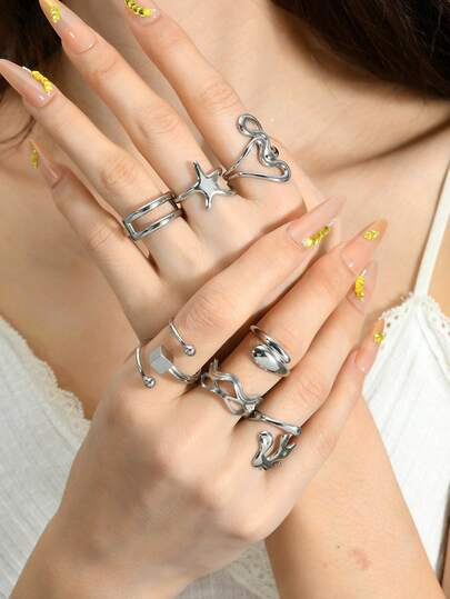 Juego de 7 anillos ajustables de acero inoxidable plateado para mujeres, que incluye elementos de estrella, línea, onda y cuadrado hueco, adecuado para uso diario y accesorios de vacaciones