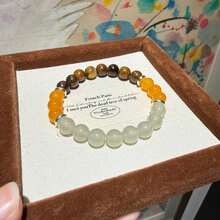 一套9条神奇水晶手链，象征着和平、财富、繁荣、友谊、好运、爱情和守护。水晶珠带来乐观积极、自信和力量，弹性手链，适合作为送给男友/女友的礼物。 - 多色 - 查看 14