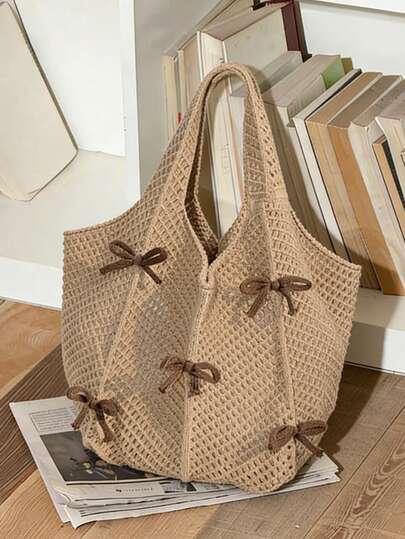This Khaki, Large-Capacity Shoulder Bag With A Bow Pattern Features Double Handles, A Solid Color Exterior, And A Fresh, Sweet, And Stylish Open Design. The Openwork Woven Design Makes It Perfect For Beach Vacations, Travel, And Shopping.