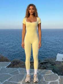 Never me Bộ jumpsuit thể thao ngắn tay hở lưng phối màu tương phản dành cho nữ, thích hợp cho chạy bộ, tập luyện, yoga. Ôm sát, co giãn, thoải mái cho mặc hàng ngày. - Màu vàng - Xem 5