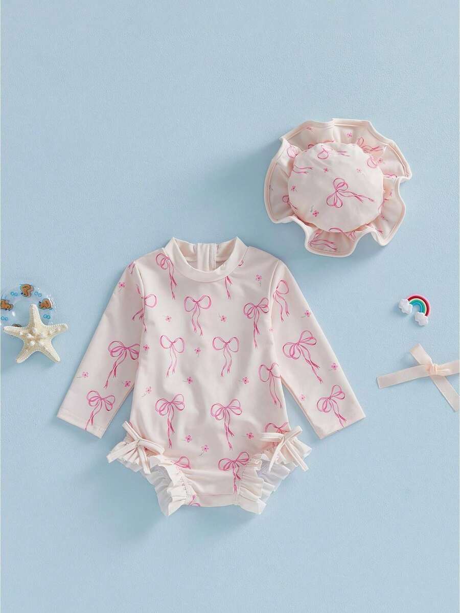 Conjunto de Traje de Baño con Protección Solar para Niña Pequeña con Estampado de Lazo, Manga Larga, Cuello Redondo, Mono con Volantes y Conjunto de Sombrero para Piscina y Playa - Caqui - Ver 1