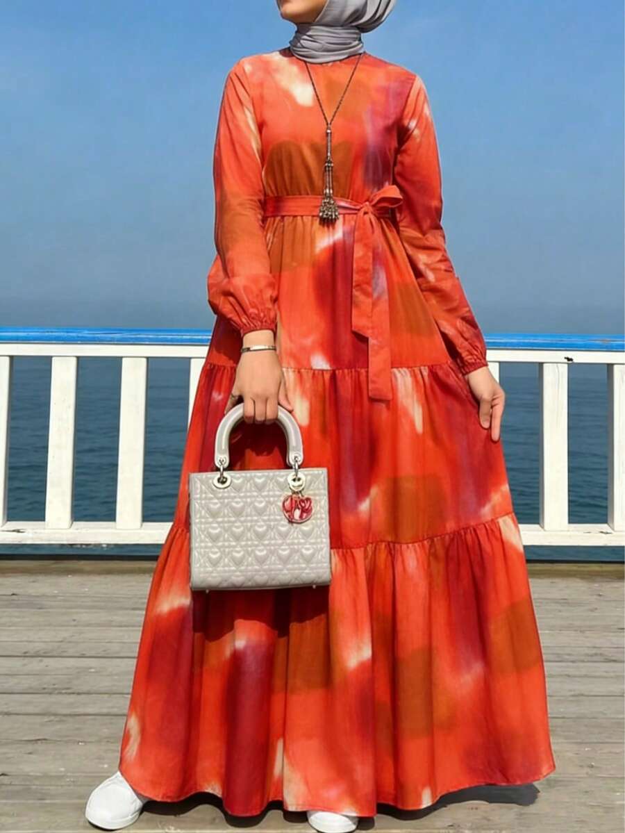 Damen orangefarbenes Kleid mit Langarm und Taillengürtel, eleganter arabischer Urlaubsstil für den Frühling