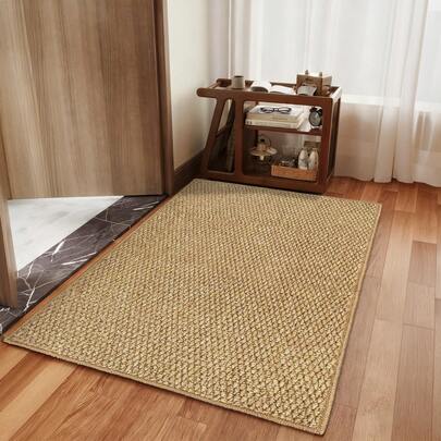 Thảm chùi chân kiểu Bắc Âu màu nâu, chất liệu giả sợi đay, vải cotton đã qua xử lý, hình bán nguyệt, tông màu đất ấm áp, thảm trang trí nhà cửa sang trọng, tiện dụng cho hành lang, phòng ngủ, dễ bảo quản.