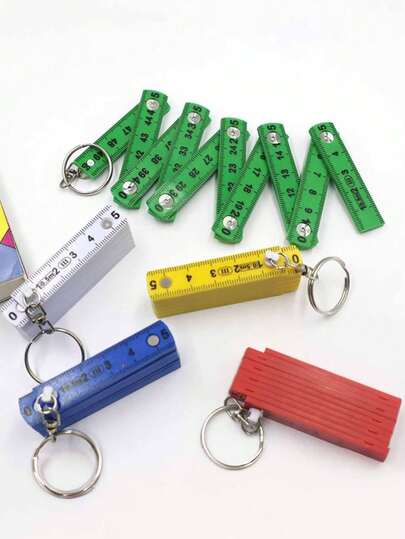 1支多功能ABS塑料折叠尺，50厘米/19.69英寸，10折，带钥匙扣，小巧便携，多用途折叠尺绘图工具 - 颜色随机