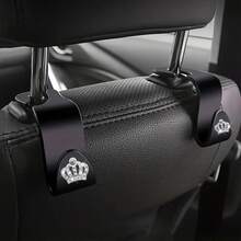 2 móc treo đồ đa năng hình vương miện sáng bóng gắn phía sau ghế xe hơi, móc treo tiện dụng tích hợp sẵn. - 2 móc treo ghế - Xem 6