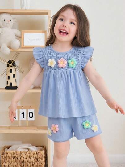 Bộ đồ hai mảnh tay ngắn xếp ly họa tiết hoa nhiều màu sắc cho bé gái, thích hợp mặc mùa xuân/hè.