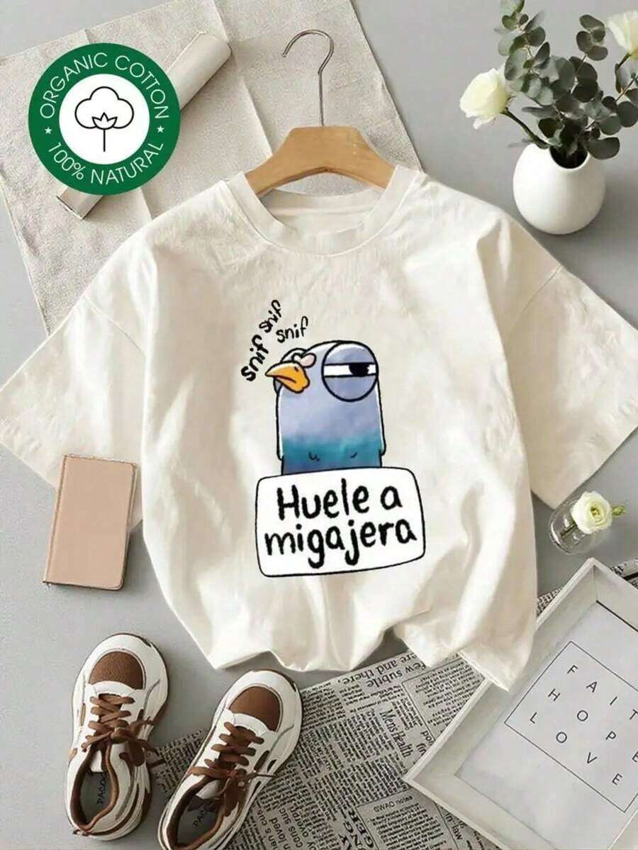 Playera Oversize para Mujer en Color Beige Neutro de Algodón con Estampado Divertido de Paloma Azul con Texto Humorístico "Huele a Migajera" Estilo Moderno y Relajado para Outfits Originales - Blanco - Ver 1