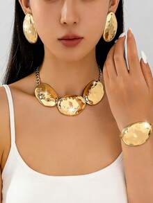 Bộ 4 món mạ vàng dáng oval, thiết kế nổi bật, gồm dây chuyền, bông tai và vòng tay, thích hợp cho nữ mặc hàng ngày và dự tiệc. - Vàng - Xem 7