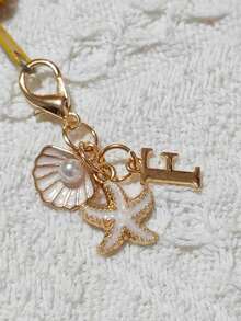 Bohemian Style Gold Letter Keychain With Shell And Starfish Decor, A-Z Letters Available, Beach And Holiday Themed Accessory, Ideal Gift For Friends, Students, Family, Beach Lovers, Vacation Essentials, Boho Fashion Accessory Suitable For Travel, Summer And Daily Use Personalized Keychain Gifts For Mother, Father, Graduation, And Teacher - Multicolor - View 27