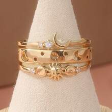 Bộ nhẫn thiết kế hình trăng lưỡi liềm tinh tế, đính đá Zirconia tổng hợp thủ công, kiểu dáng nửa vầng trăng mỏng nhiều lớp. Thanh lịch và đa năng, thích hợp làm nhẫn đôi lãng mạn, món quà ý nghĩa dành cho nàng. - Vàng - Xem 4