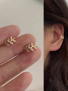1 đôi khuyên tai kẹp hình lá tối giản, không cần xỏ lỗ tai, có thể điều chỉnh kích thước. - Vàng - Xem 2