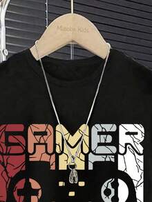 Conjunto casual diario de camiseta de manga corta con cuello redondo y estampado de videojuegos, y pantalones cortos para niño - Negro - Ver 5