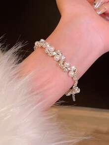 1. 轻盈奢华闪耀钻石镶嵌珍珠手链，小众精致手链，彰显个性高端气质，母亲节礼物手链 - 銀色 - 查看 2