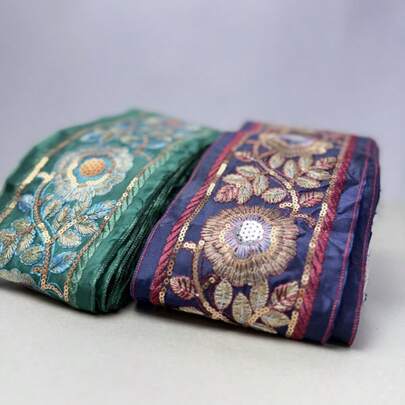 1 thước vải tua rua thêu màu xanh đậm, dùng để trang trí phụ kiện may mặc DIY.