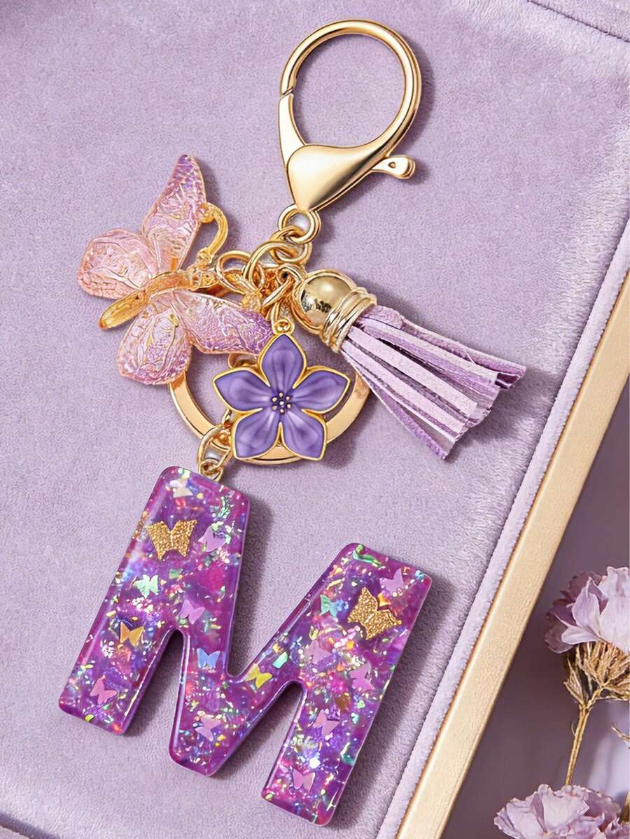 1个紫色蝴蝶字母钥匙扣，饰有闪亮亮片、流苏和珐琅花朵吊坠，时尚手提包挂件，母亲节礼物 - 淡紫色 - 查看 1