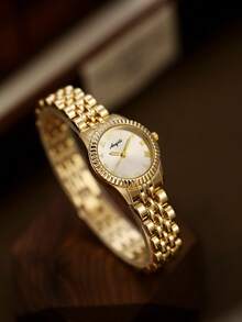 这款金色圆形女士石英表，设计时尚优雅，是日常佩戴的理想之选，也是生日和毕业礼物的完美选择。 - 金色 - 查看 5
