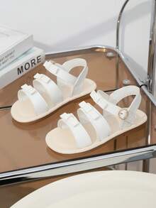 1 paire de sandales de plage blanches pour filles, couleur unie, patchwork en PU souple et tissu, décoration nœud, fermeture à crochet et boucle sur une seule sangle au talon, sandales plates style princesse mignon et à la mode, convient pour le quotidien décontracté, les vacances à la plage, le port en extérieur, printemps/été nouveau 2026 - Blanc - Voir 6