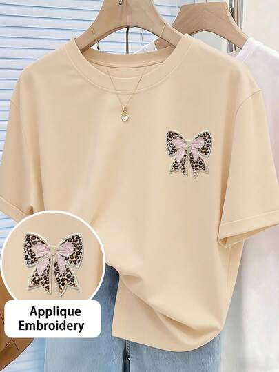 Teenage Girl Beige Bow Embroidered T-Shirt, Leopard Print Pink Bow Decor, Casual Round Neck Short Sleeve T-Shirt, Suitable For School, Hangout With Friends, Daily Casual Wear
