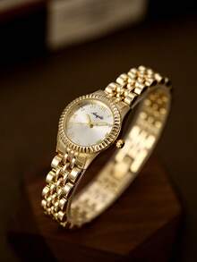 这款金色圆形女士石英表，设计时尚优雅，是日常佩戴的理想之选，也是生日和毕业礼物的完美选择。 - 金色 - 查看 2