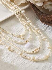 4件套贝壳、海星和珍珠项链套装，适合女士海滩度假和旅行 - 彩色 - 查看 4