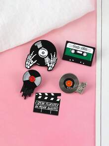 Bộ sưu tập 5 chiếc ghim cài áo phong cách retro với các họa tiết âm thanh, hình đầu lâu, bàn tay, đĩa than, bảng quay phim, những chiếc ghim cài độc đáo mang phong cách rock cổ điển dành cho trang phục. - Nhiều màu - Xem 6