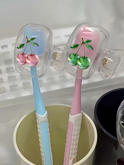 2 piezas Soporte para cepillo de dientes con cristal rosa en forma de cereza y cristal verde en forma de cereza, diseño lindo para uso en viajes y hogar con tapa transparente, compacto y portátil, protege los cabezales del cepillo de dientes, con orificios de drenaje y ventilación duales, adecuado para el hogar, dormitorio y uso al aire libre