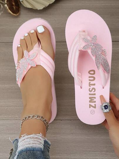 Dép xỏ ngón đính đá và nơ cho nữ, dép đế xuồng chống trơn trượt mùa hè, dép đế bằng kiểu dáng nghỉ mát.