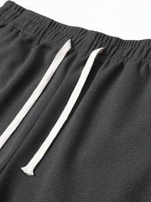 男士华夫格休闲短裤，简约舒适风格，适合夏季日常穿着和轻度运动。 - 灰色 - 查看 10