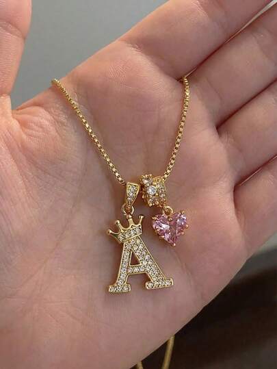 1 chiếc vòng cổ chữ cái đầu tiên, mặt dây chuyền hình vương miện và trái tim màu hồng, nhiều mặt dây chuyền chữ cái A-Z, dây chuyền thép không gỉ, thích hợp làm quà tặng cho mẹ nhân Ngày của Mẹ hoặc cho bé gái, phụ kiện trang sức trang trí hàng ngày.