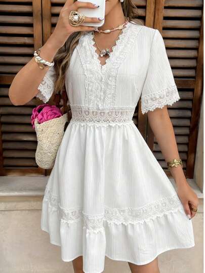 女士纯色休闲打结刺绣连衣裙