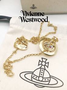 Vivienne Westwood Bộ sưu tập mặt dây chuyền Tiny Orb mới, dây chuyền Aurora Pilot cỡ trung, mạ vàng, bằng đồng thau, đính đá lấp lánh. - Vàng - Xem 8