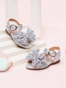 Giày sandal mới năm 2026 cho bé gái, giày công chúa cho trẻ em với nơ đính đá, giày đi biển cho bé gái học sinh, giày mùa hè. - Bạc - Xem 5