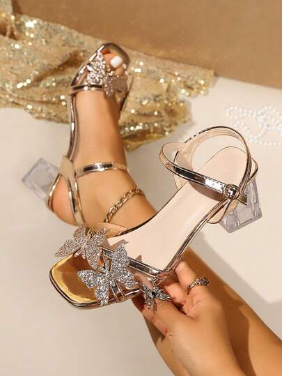 新款夏季优雅女士高跟凉鞋，闪亮蝴蝶装饰，多种颜色可选（金色、银色、黑色），6厘米水晶鞋跟，适合日常、工作、派对、约会等场合，是馈赠佳品。