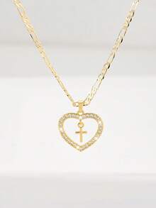 Dây chuyền thánh giá dành cho nữ với khung hình trái tim và đá Zirconia đính kèm, nhỏ nhắn và tinh tế với kết cấu mịn, đá Zirconia lấp lánh và chắc chắn, lý tưởng để làm quà tặng và đeo hàng ngày, tượng trưng cho sự bảo vệ và tình yêu. - Vàng - Xem 9