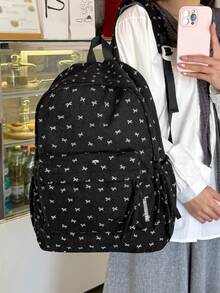 新款灯芯绒蝴蝶结印花女士背包，大容量休闲实用，是校园生活和学生使用的理想之选。适合上课、返校、户外活动或旅行。它不仅便于携带，而且容量大。 - 黑色 - 查看 8