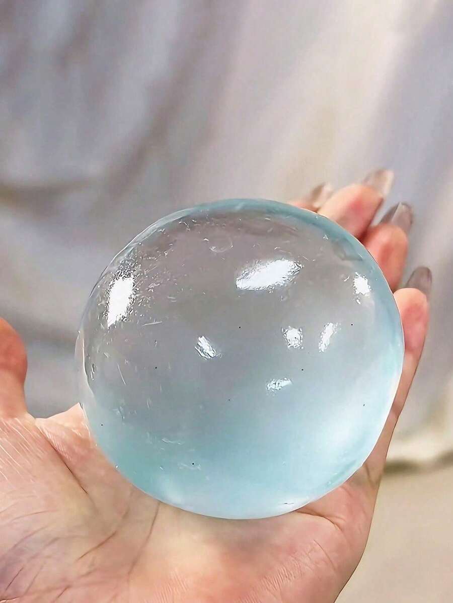 成人减压桌面玩具，蒸汽造型，柔软可爱 - 一款柔软可拉伸的圆形指尖玩具，趣味新颖，适合成人聚会、办公桌和家居装饰。 - 水晶球 - 查看 1