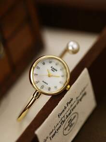 金色圆形手镯式女士石英表，时尚精致简约艺术设计，适合日常佩戴，亦可作为礼物赠送。 - 金色 - 查看 3