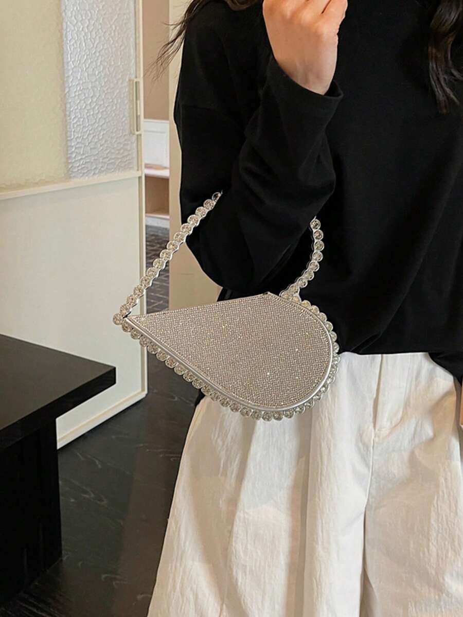 Túi xách hình trái tim đính kim cương lấp lánh, ví cầm tay dạ hội sang trọng đính đá quý, túi dự tiệc pha lê sáng bóng, phong cách quý phái thanh lịch tinh tế.