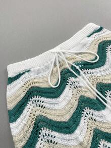 Bộ đồ nữ mùa xuân kiểu Âu Mỹ gồm áo tay ngắn và quần short dệt kim khoét lỗ, thích hợp cho kỳ nghỉ. - Nhiều màu - Xem 10