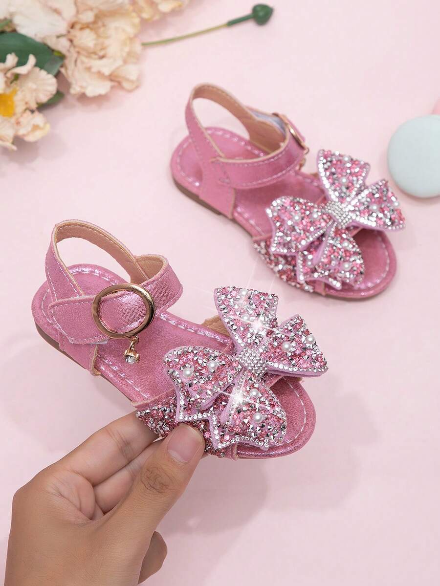 2026 Nuevas sandalias para niñas, zapatos de princesa para niños con lazo de strass, zapatos de playa para estudiantes de niña pequeña, verano - Rosa - Ver 1
