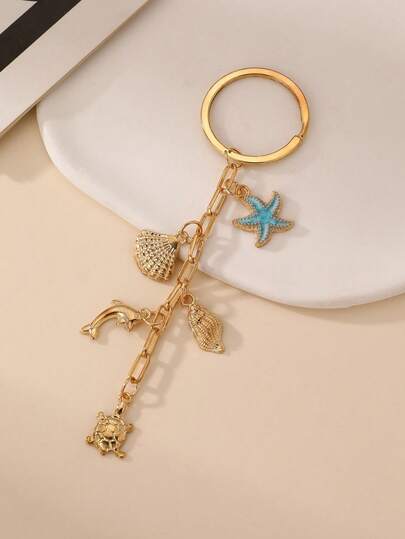 1个时尚金属优雅蓝色海星、海豚、贝壳、海龟钥匙扣，适合日常使用、春夏、海滩度假包包装饰配件