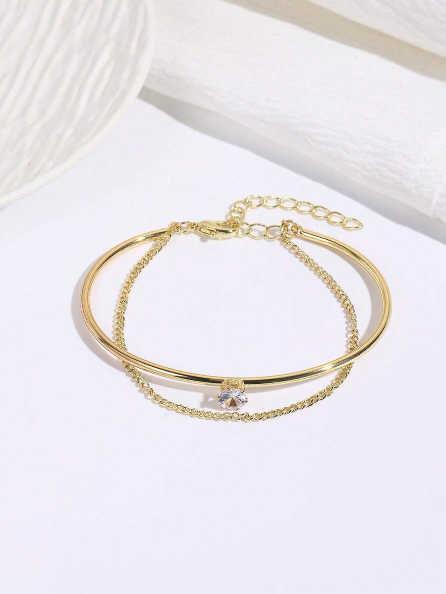 1. Vòng tay đơn giản đính một viên kim cương, dây xích điều chỉnh được, phù hợp cho nữ giới đeo hàng ngày. - Vàng - Xem 1