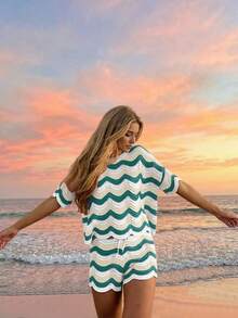 Bộ đồ nữ mùa xuân kiểu Âu Mỹ gồm áo tay ngắn và quần short dệt kim khoét lỗ, thích hợp cho kỳ nghỉ. - Nhiều màu - Xem 6