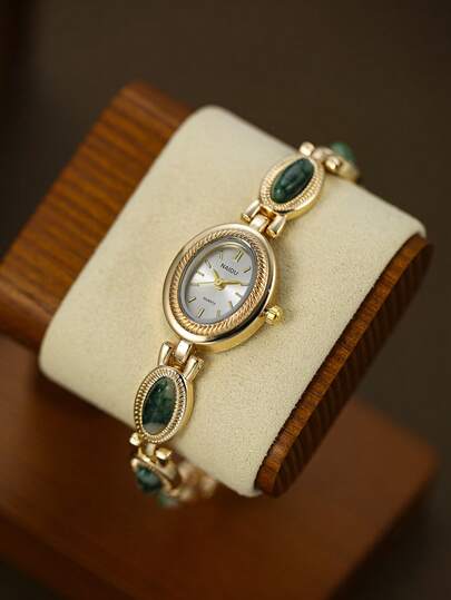 Đồng hồ nữ thạch anh hình bầu dục mang phong cách cổ điển thời trang, tinh tế, phù hợp để đeo hàng ngày và là lựa chọn quà tặng tuyệt vời.