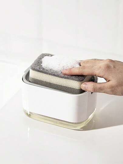 1个手动按压式海绵皂液器，厨房洗洁精分配器，一体式收纳设计，家庭清洁必备，适合家庭主妇、租房者、厨房爱好者，可用于日常洗碗和厨房收纳，实用家居用品，也是送给家人、朋友、乔迁之喜的贴心礼物。